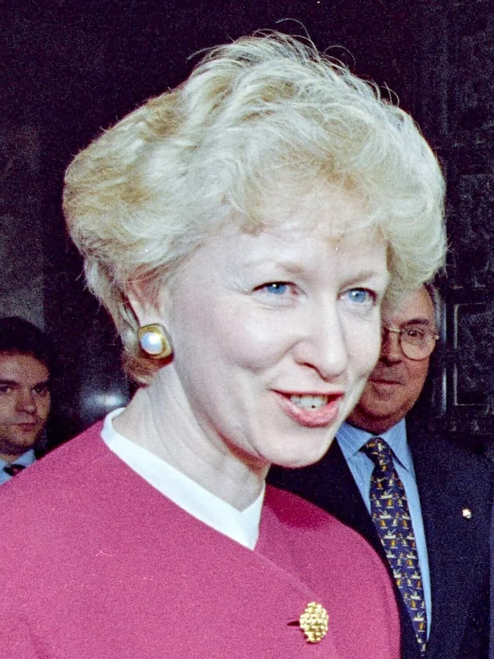 Canadian Prime Minister Kim Campbell walking with Bill Clinton (not shown) after a news conference at the G7 Summit in Tokyo, Japan.