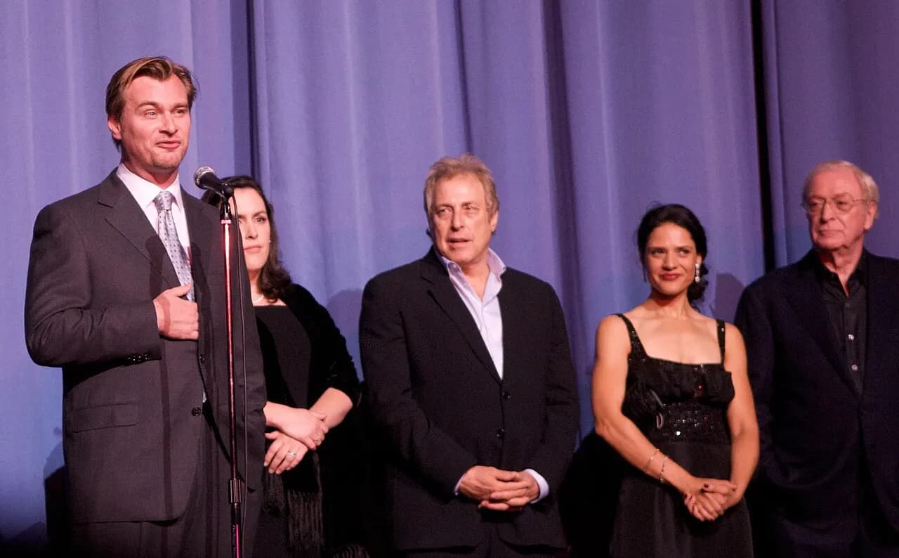 Cast and crew of The Dark Knight at the European premiere in London. From left to right: Director Christopher Nolan, producers Emma Thomas and Charles Roven, ac