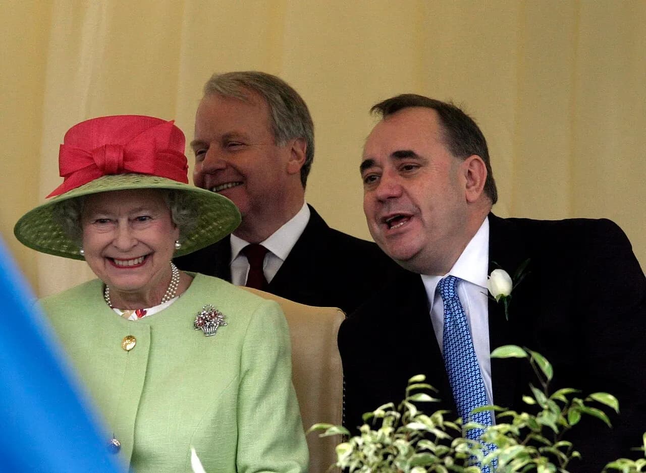 First Minister Alex Salmond MSP talks with Her Majesty The Queen as they watch the Riding marking the opening of the third session of the Scottish Parliament (3