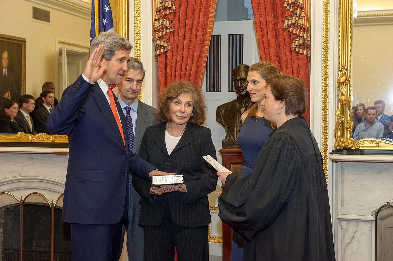 Supreme Court Justice Elena Kagan swears in Secretary of State John Kerry on February 1, 2013 in the Foreign Relations Committee Room in the Capitol. They were 