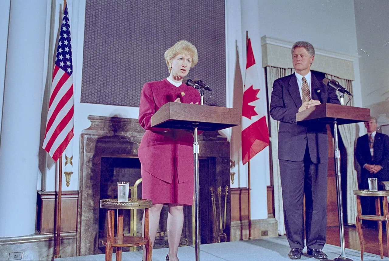 Bill Clinton at a news conference with Canadian Prime Minister Kim Campbell at the G7 Summit in Tokyo, Japan.