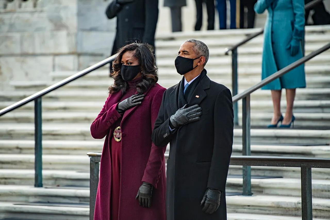 Former President Barack Obama and former First Lady Michelle Obama render honors during a Presidential Armed Forces Full Honors Wreath-Laying Ceremony at the To