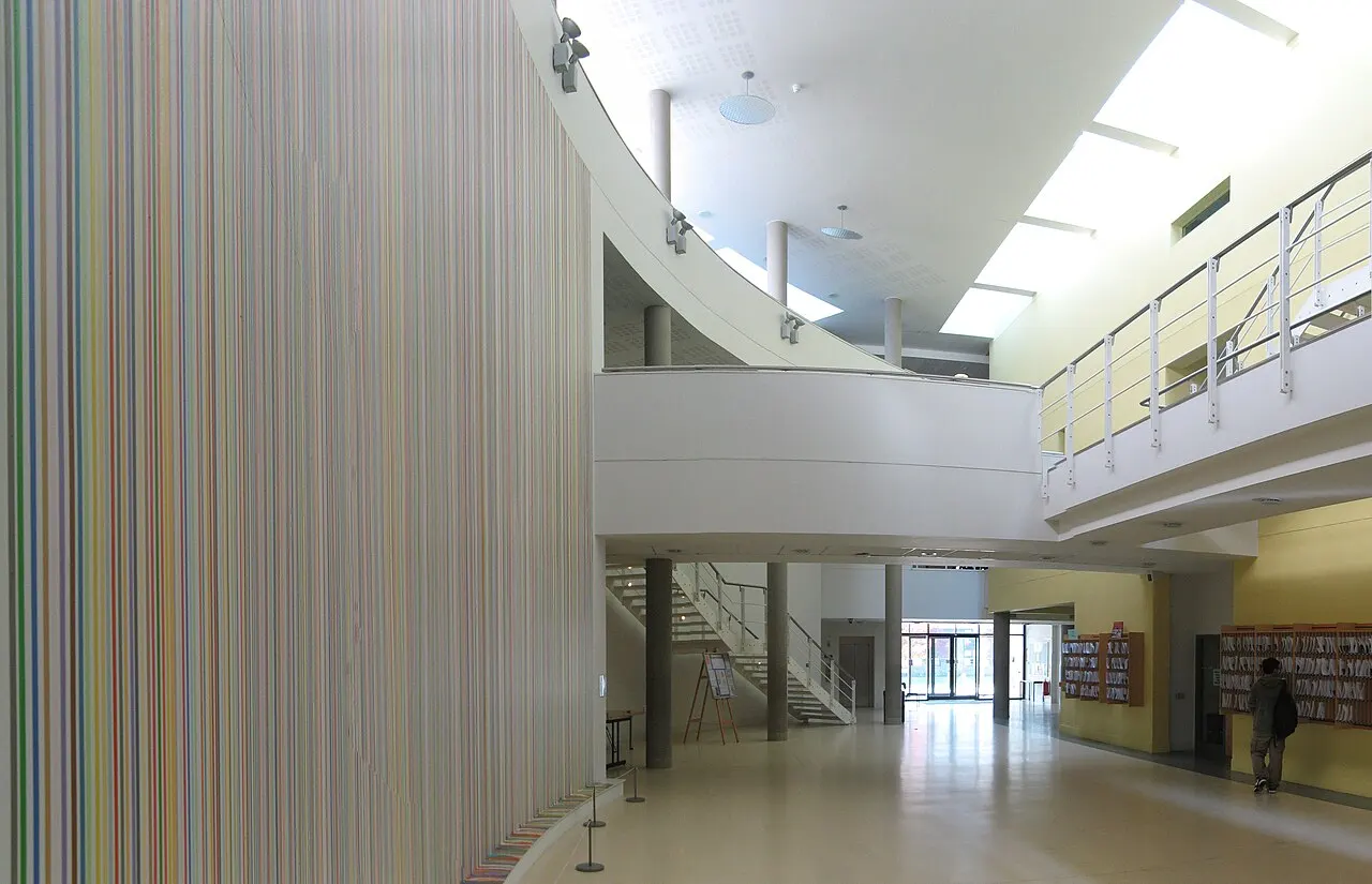 Department of Mathematics foyer, in the Zeeman building (Institute of Mathematics and Statistics), University of Warwick. The paint-poured art work on the left 