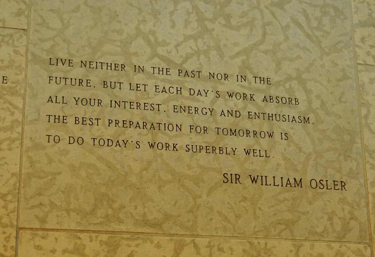 A quote by Sir William Osler engraved in the stone wall within the Peace Chapel of the International Peace Gardens (in Manitoba Canada and North Dakota, USA).